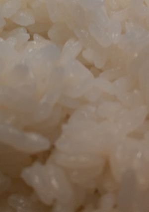 A picture of Cooking plain rice with non-stick pan.