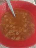 Sopa aguada de estrellita con puré de tomate
