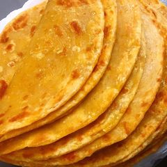 A picture of Soft layered carrot chapattis.