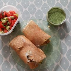 A picture of Spicy Potato-filled Dosa with Green Chilli Chutney.