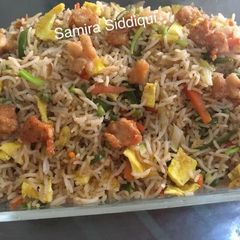 A picture of Chicken fried rice.