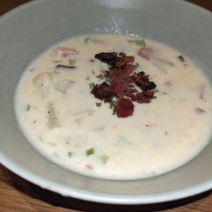 A picture of Creamy loaded ham and potato soup with bacon.