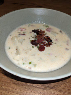 A picture of Creamy loaded ham and potato soup with bacon.