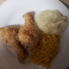 A picture of Baked breaded chicken legs.