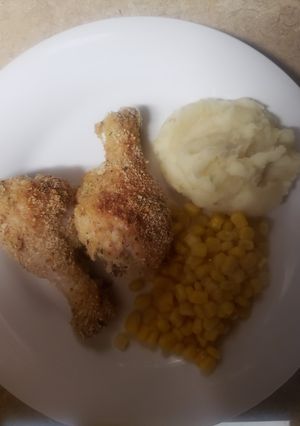 A picture of Baked breaded chicken legs.