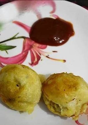 A picture of Soya chunks and potato filled appam recipe.