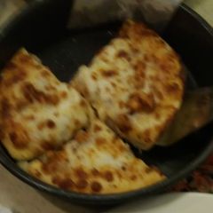 A picture of Chicken tikka pizza # cookpadramadan.