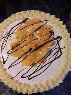 Una foto de Torta de durazno y crema