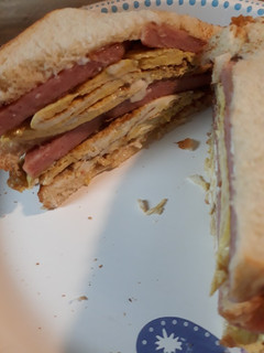A picture of Folded Browned Folded Eggs with Spam Sandwich.