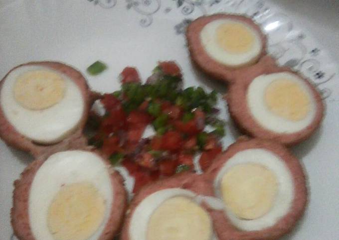 Scotch eggs served with kachumbari