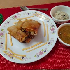 A picture of Crispy Cheese and mix veg.masala Dosa.