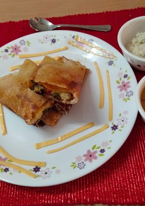A picture of Crispy Cheese and mix veg.masala Dosa.