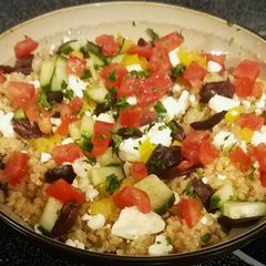 A picture of Greek style quinoa bowl.