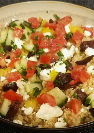 A picture of Greek style quinoa bowl.