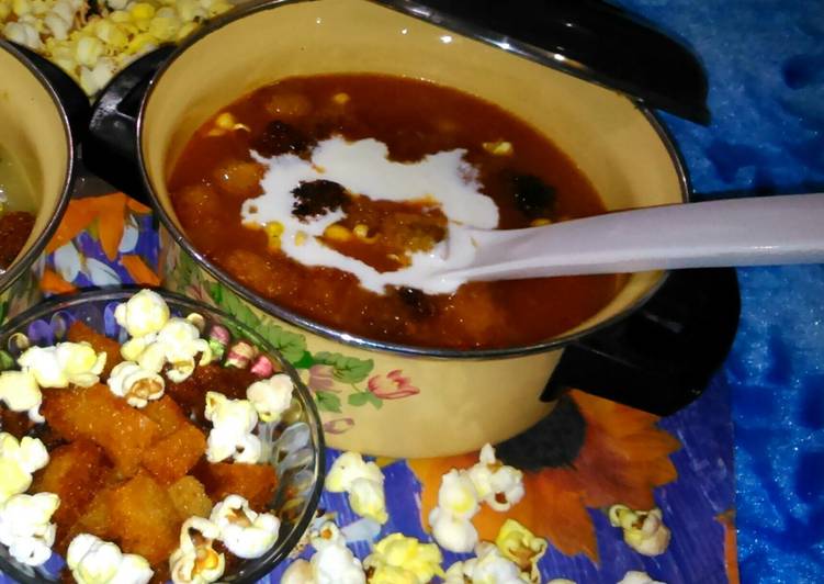 Expensive tomato soup with Fried Bread and Popcorns