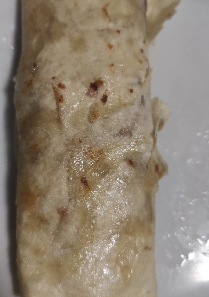 Una foto de Rollito de hamburguesa y huevo