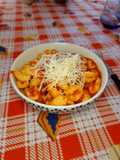 Ñoquis de papa con salsa boloñesa