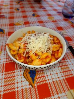 Una foto de Ñoquis de papa con salsa boloñesa