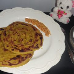 A picture of Haldi Ka Lachha Paratha.
