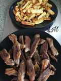 Pluma a la plancha con patatas fritas en freidora sin aceite