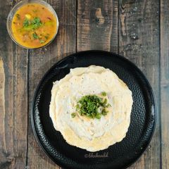 A picture of Lau pitha / Bottle gourd pitha.