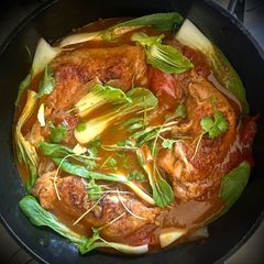 A picture of Poule ar Tamarin ek Brèdes Chinois – Mauritian chicken with tamarind and pak choi.