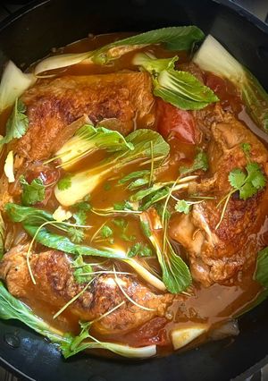 A picture of Poule ar Tamarin ek Brèdes Chinois – Mauritian chicken with tamarind and pak choi.