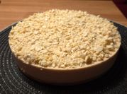 Una foto de tarta de cuajada y turron