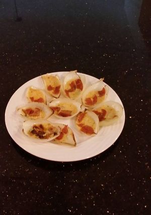A picture of Pan Roasted Cheese Filled Onion Petals with Bacon a6nd Pepperoni.