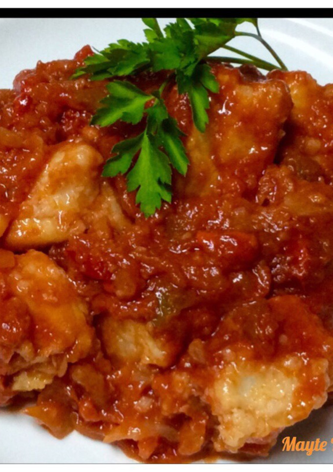 Una foto de Bacalao con tomate