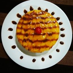 A picture of Eggless Mango Cake😍without oven.