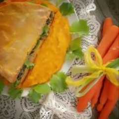 A picture of Sandwich di frittata al vapore con purè di carote.