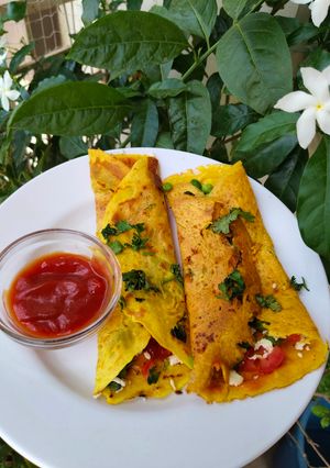 A picture of Besan chilla with stuffing.