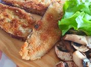 Una foto de milanesa con hongos