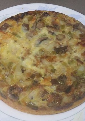 Foto principal de Tortilla de patatas con ajos tiernos y setas
