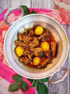 নতুন আলু ও নারকেল বাটায় হাঁস ভুনা রেসিপির প্রধান ছবি