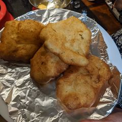 Bhatura - puffed fried bread A picture of Bhatura - puffed fried bread.