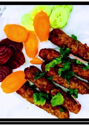 A picture of Chicken seekh kebabs.