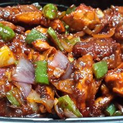 A picture of Dry Chilli Chicken.