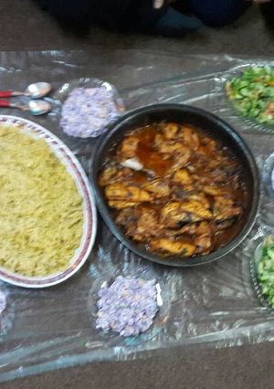 صورة لوصفة جاج مع خل وليمون وتوم مدخن.ورز بالبرتقال😋