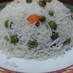 White rice with veggies A picture of White rice with veggies.