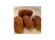 Una foto de croquetas de pollo de españa