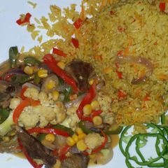 A picture of Rice with shredded beaf sauce.