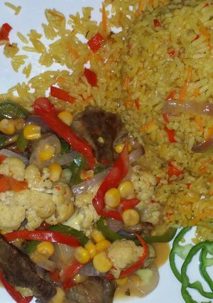 A picture of Rice with shredded beaf sauce.