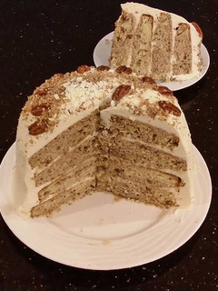 A picture of Toasted Butter Pecan Layer Cake with Whipped White Chocolate Cream.