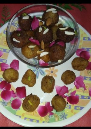 A picture of Dodholi_rice gulabjamun.
