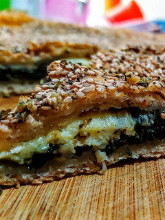 Una foto de PANSITO Relleno con Espinacas🌿y Mozzarella🧀...!