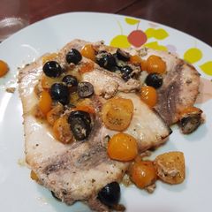 A picture of Swordfish with Cherry Tomatoes and Olives.