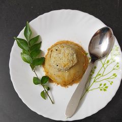 A picture of Coconut shell Idli.