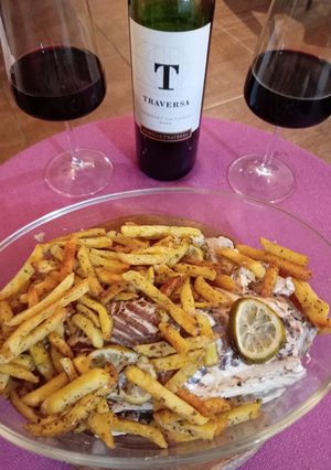 Una foto de Merluza al natural con papas al horno